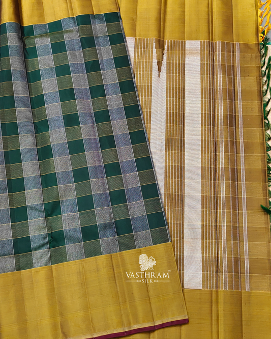Green colour kanchivaram silk saree with silver and gold zari checks all over