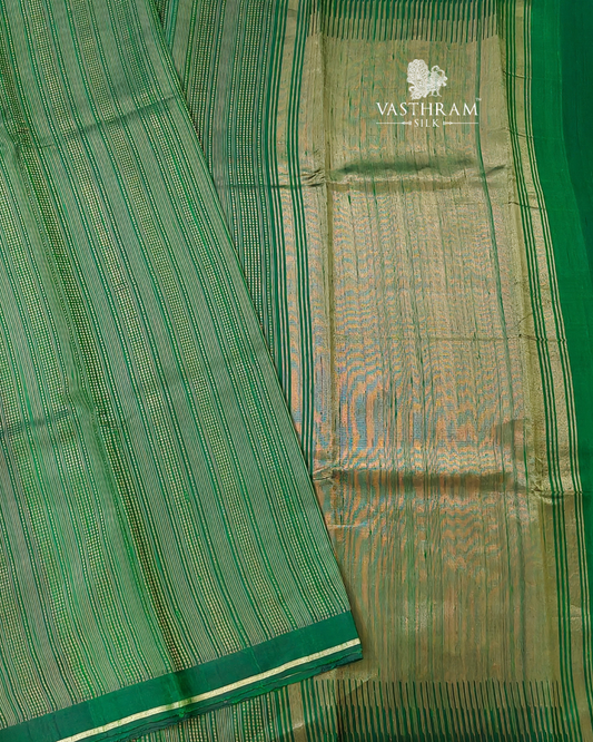 Dark Green Colour Raw Silk With Zari Stripes All Over