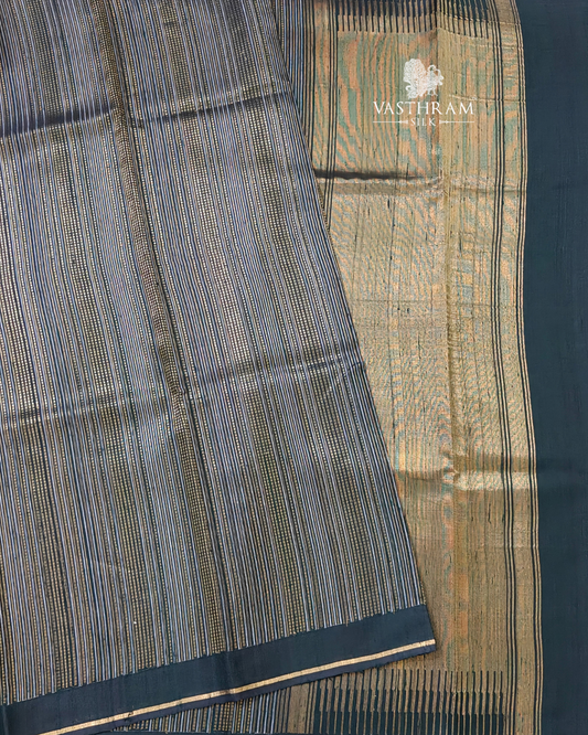 Bottle Green raw silk saree With Zari Stripes All Over