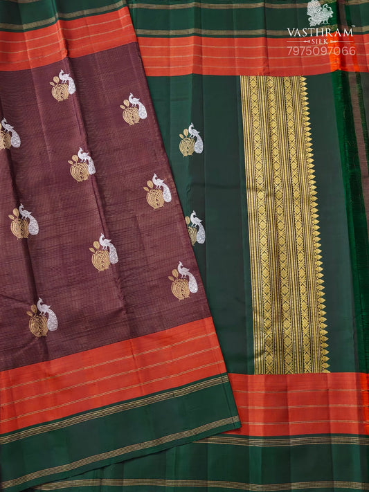 Brown Colour Kanchivaram Silk Saree With Zari Stripes & Silver With Gold Peacock Zari Motif All Over Code : KA0415