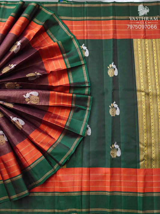 Brown Colour Kanchivaram Silk Saree With Zari Stripes & Silver With Gold Peacock Zari Motif All Over Code : KA0415