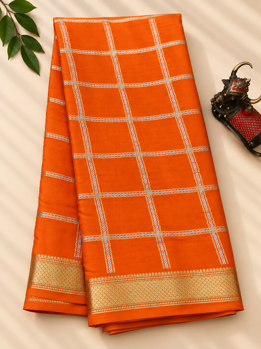 Orange colour mysore crepe silk saree with silver & gold zari checks all over