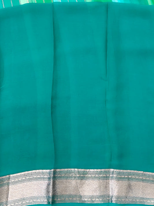 Sky Blue colour georgette saree with zari stripes all over