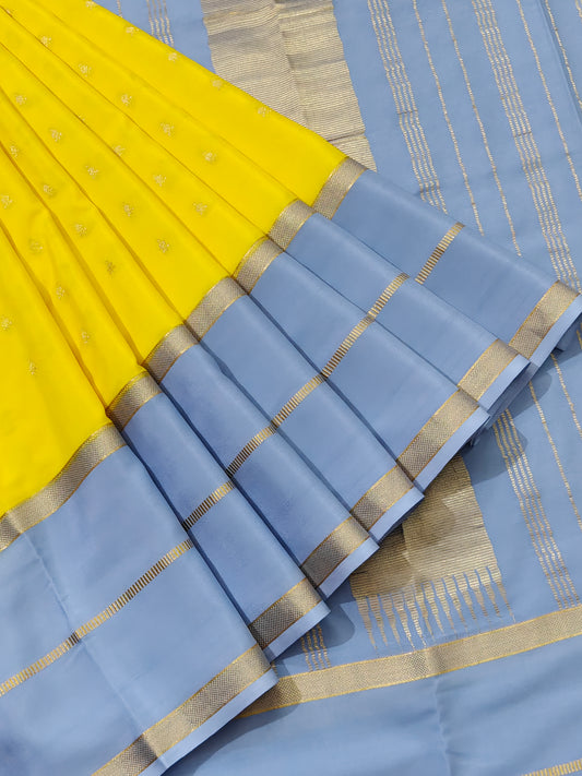 Yellow Colour Mysore Crepe With Zari Buttas All Over