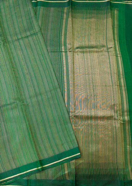 Dark Green Colour Raw Silk With Zari Stripes All Over