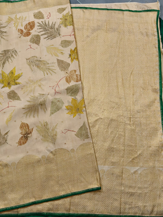 Cream colour kanchivaram silk saree with eco print all over