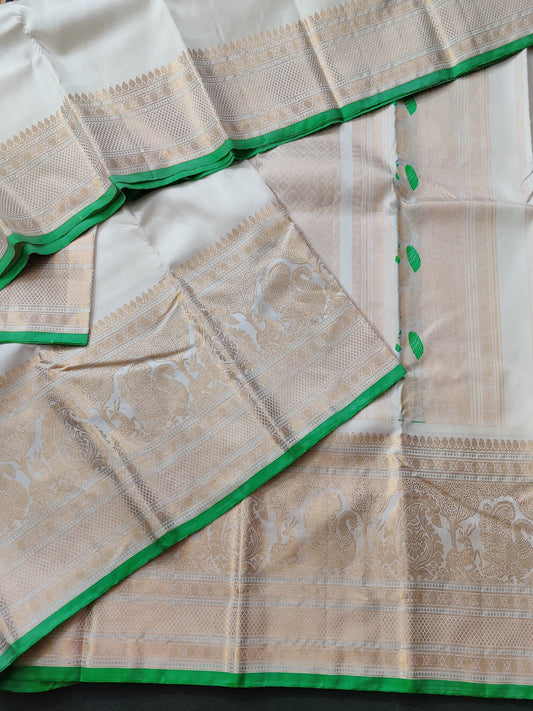 White Colour Gadwal Silk With Peacock Zari Border Code : GA013