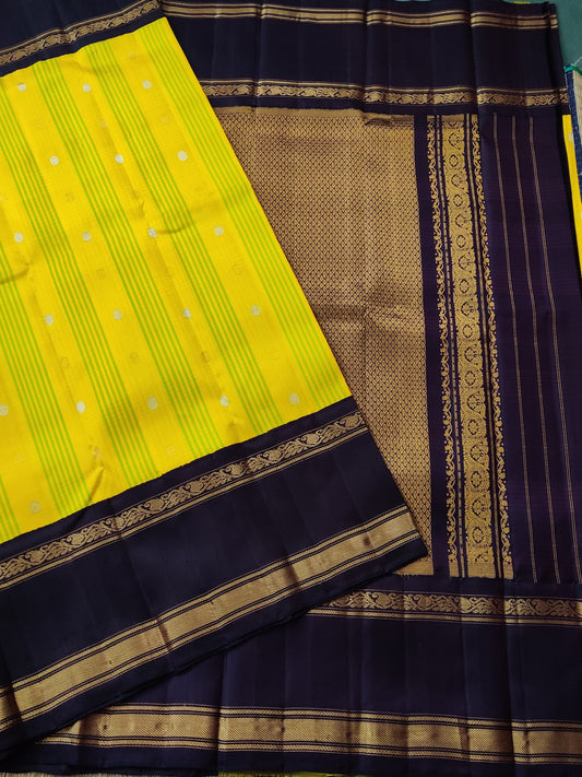 Yellow Colour Gadwal Silk Saree With Checks & Zari Butta All Over