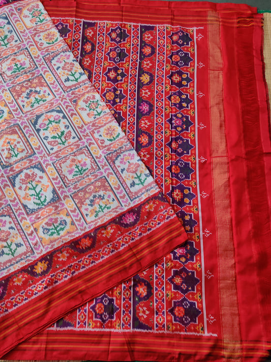 White Colour Ikkat Silk Saree With Ikkat Weaving All Over