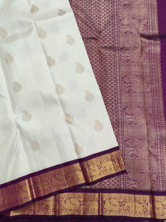 White Colour Pure Silk Pure Zari Kanchivaram Saree With Zari Butta All Over