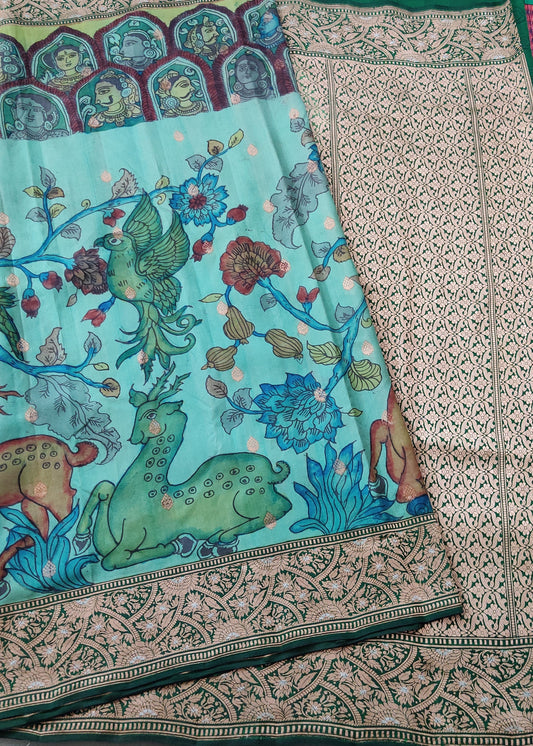 Sea Blue Colour Banarasi Silk Saree With Hand Pen Kalamkari All Over Code : VB0193