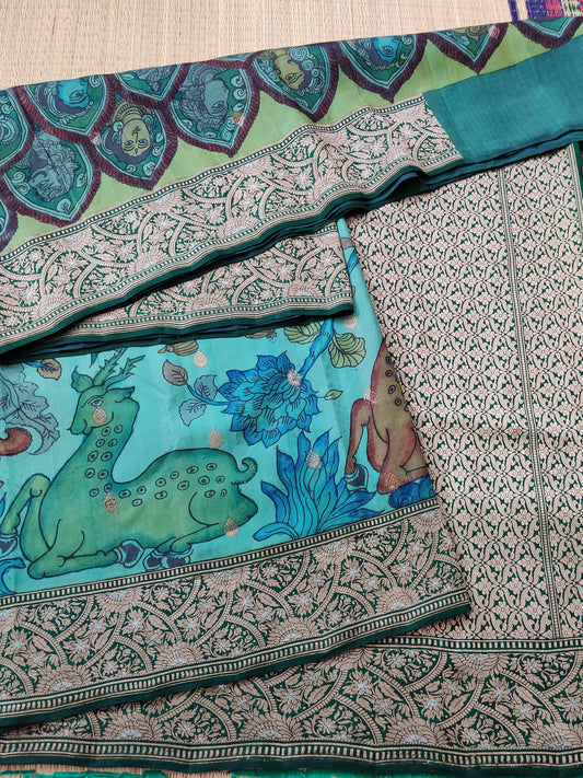 Sea Blue Colour Banarasi Silk Saree With Hand Pen Kalamkari All Over Code : VB0193