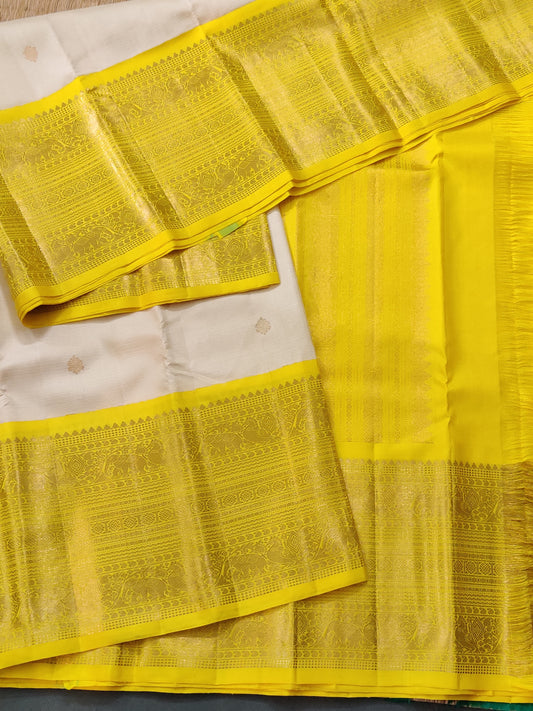 Off White Colour Kanchivaram Silk Saree With Zari Butta All Over Code : KA0259