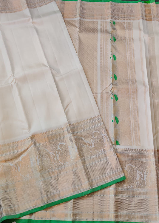 White Colour Gadwal Silk With Peacock Zari Border Code : GA013