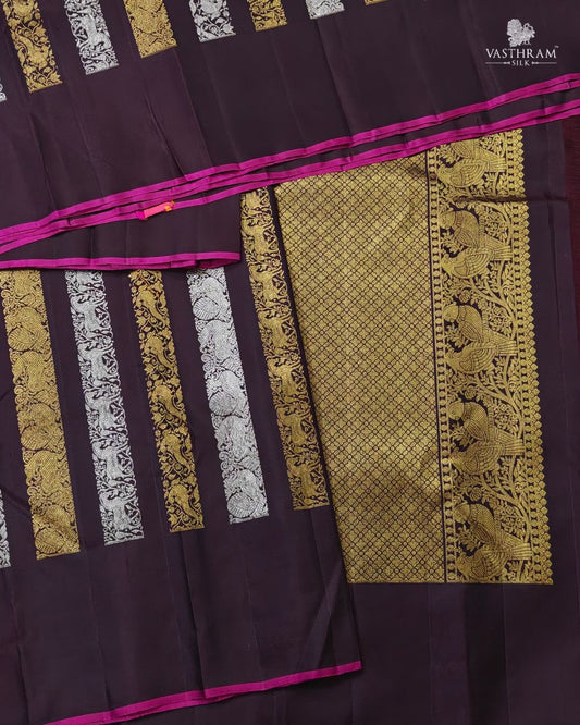 Brown colour kanchivaram silk saree with silver & gold zari stripes all over