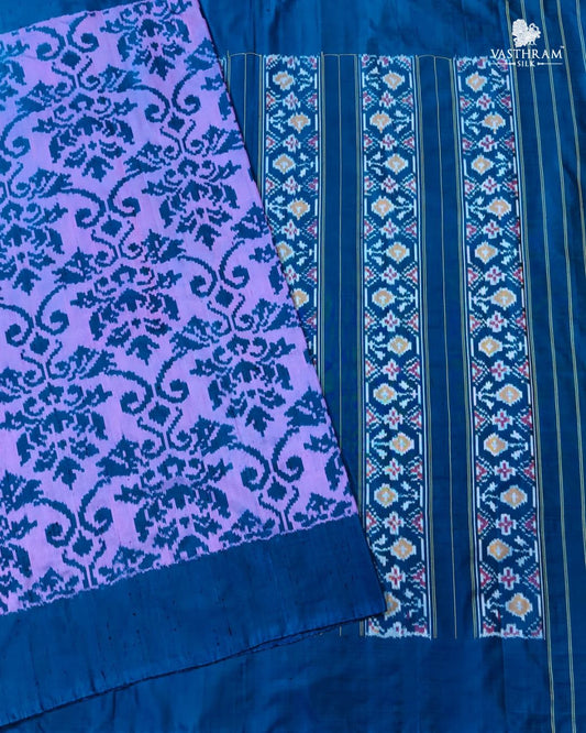 Lavender colour ikkat silk saree with ikkat weaving all over