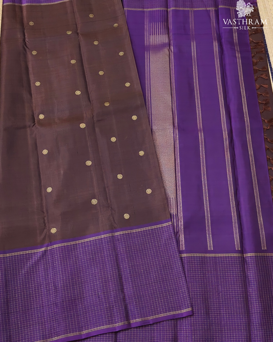 Brown colour pure zari kanchivaram silk saree with rudhraksham zari butta all over