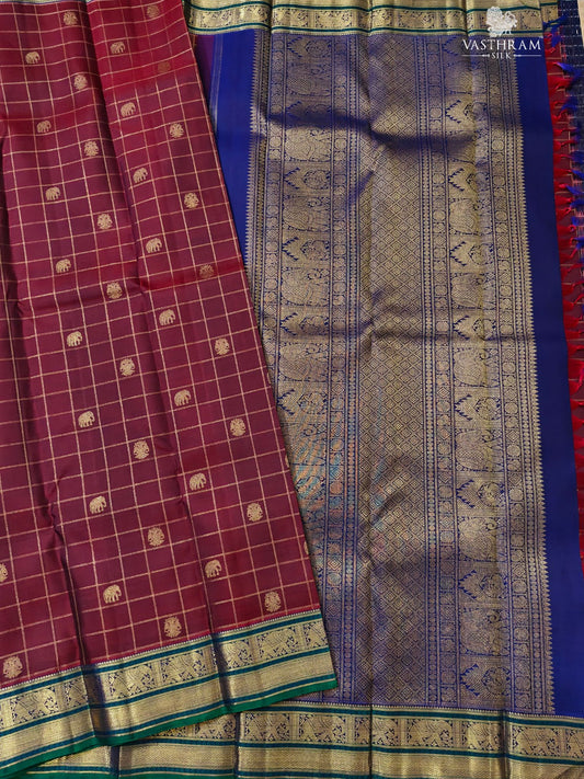 Maroon Colour Pure Zari Kanchivaram Silk Saree With Gandberunda & Rudraksham Zari Butta All Over Code : KA0503
