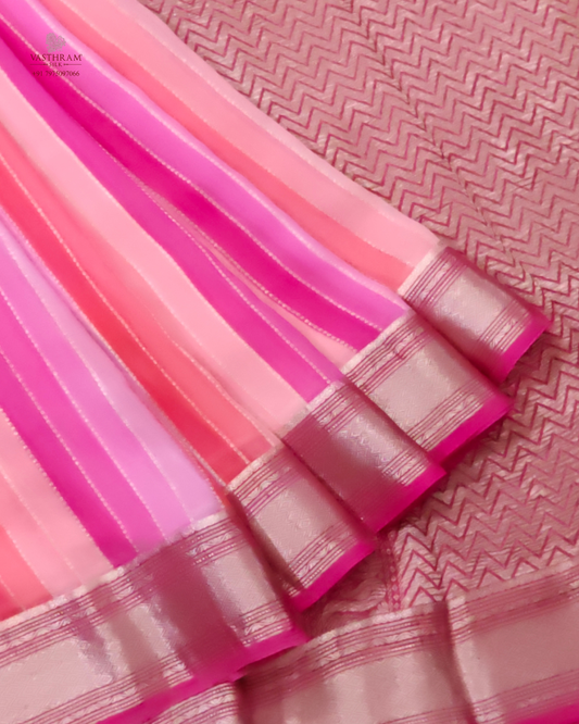 Pink colour georgette saree with zari stripes all over