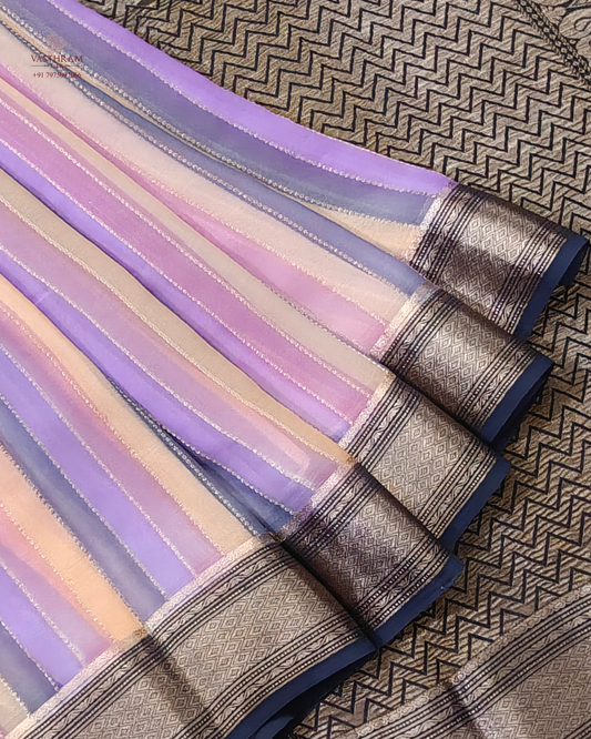 Lavender colour georgette saree with zari stripes all over