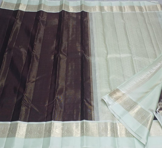 Brown colour kanchivaram silk saree with zari strips