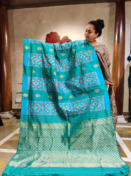 Turquoise Colour Ikkat Silk Saree With Zari And Ikkat Weaving All Over