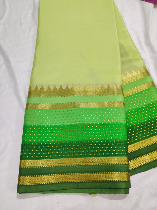 Light Pista Green Colour Mysore Crepe Silk Saree With Plain Body Code : KA0165