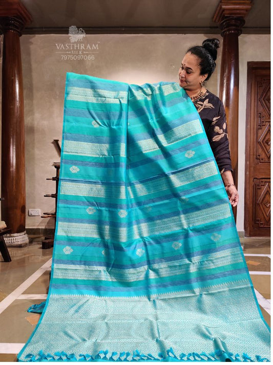 Turquoise Blue Colour Borderless Kanchivaram Silk Saree With Silver Zari Butta & Thread Woven Strips Body Code : KA0403