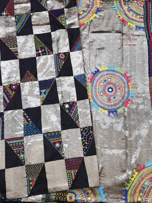 Black &amp; Silver colour kanchivaram silk saree with lambani work all over