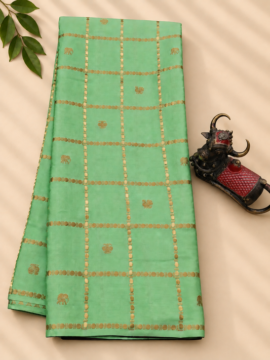 Pista green colour Mysore crepe silk saree with zari checks &amp; ganda berunda motif all over