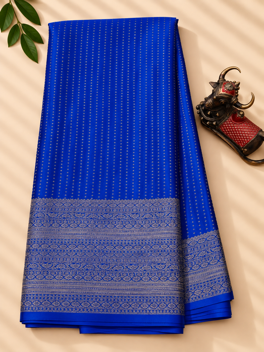 Royal blue colour crush mysore crepe silk saree with small zari butta all over