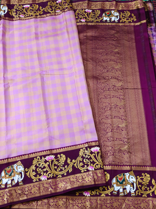 Light lavender colour kanchivaram silk saree with checks all over