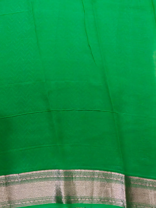 Light Green colour georgette saree with zari stripes all over