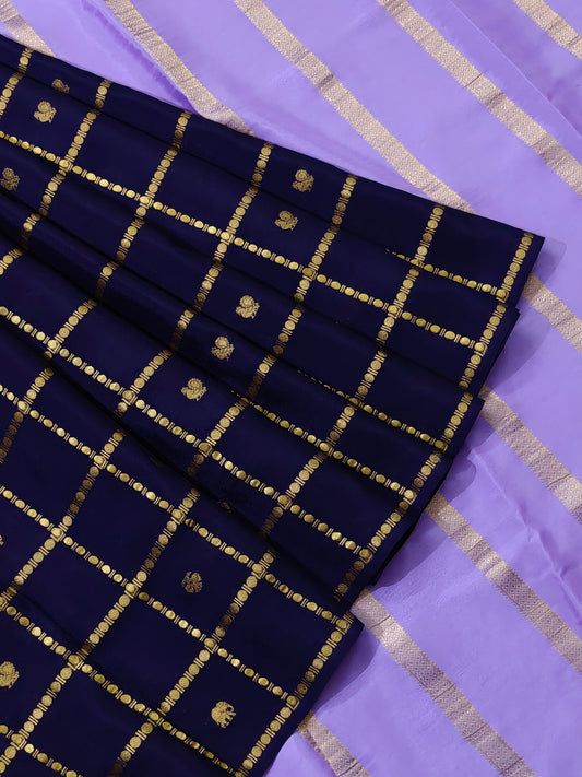 Navy blue colour Mysore crepe silk saree with zari checks & ganda berunda motif all over
