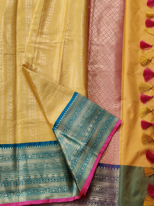 Yellow Colour Semi Banarasi Saree With Zari Motif All Over