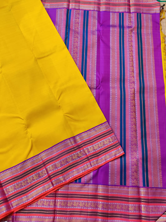 Yellow Colour Kanchivaram Silk Saree With Plain Body