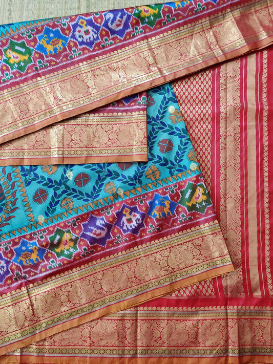 Sky Blue Colour Ikkat Silk Saree With Hand Madhubani Work All Over