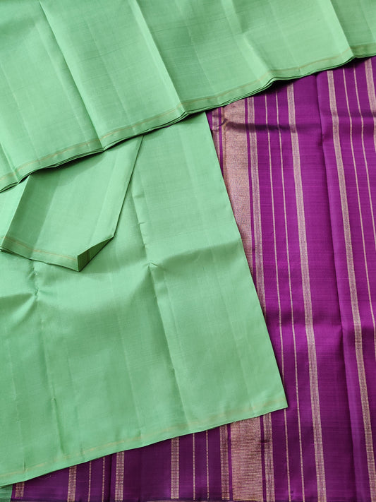 Pastel Green Colour Kanchivaram Silk Saree With Plain Body