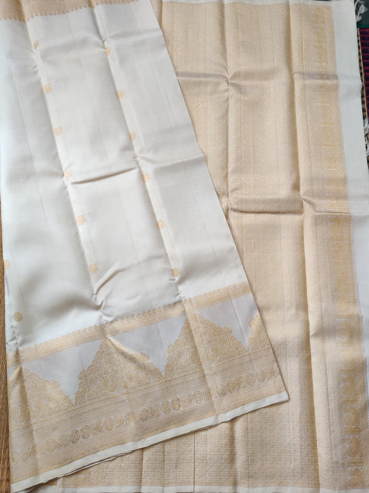 Cream Colour Kanchivaram Silk Saree With Zari Butta All Over Code : KA082