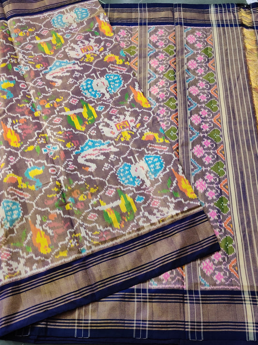 Grey Colour Tissue Ikkat Silk Saree With Ikkat Weaving All Over Code : IK014