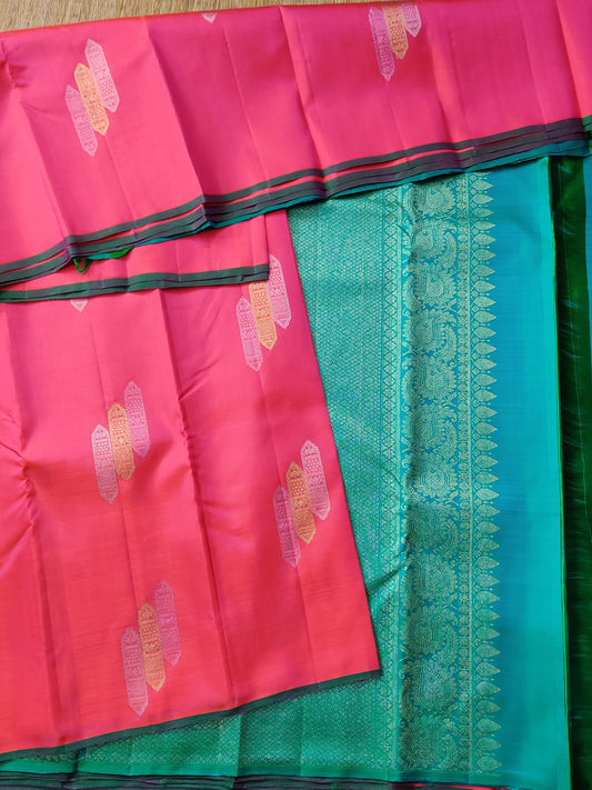 Dual Tone Orange Colour Borderless Kanchivaram Silk Saree With Silver & Gold Zari Butta All Over Code : KA0266