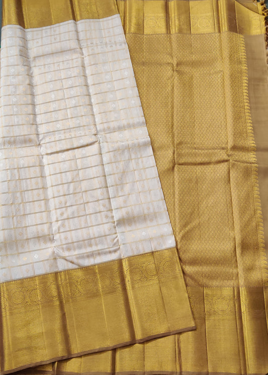 Off White Colour Kanchivaram Silk Saree With Zari Checks & Floral Motif All Over Code : KA0332