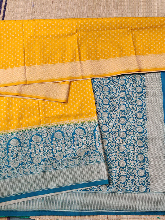 Yellow Colour Semi Banarasi Saree With Zari Butta All Over Code : VB0431