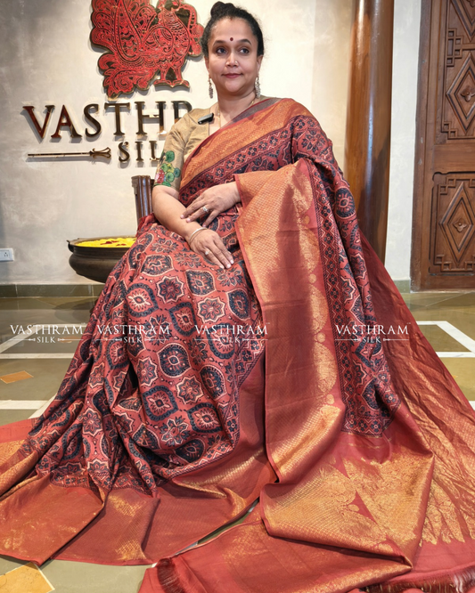 Maroon colour kanchivaram silk saree with ajrakh print all over
