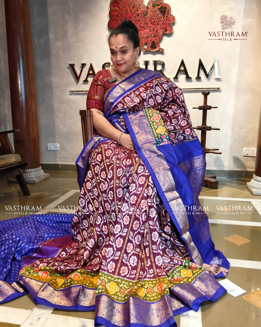 Wine colour ikkat silk saree with ikkat weaving & zari stripes all over