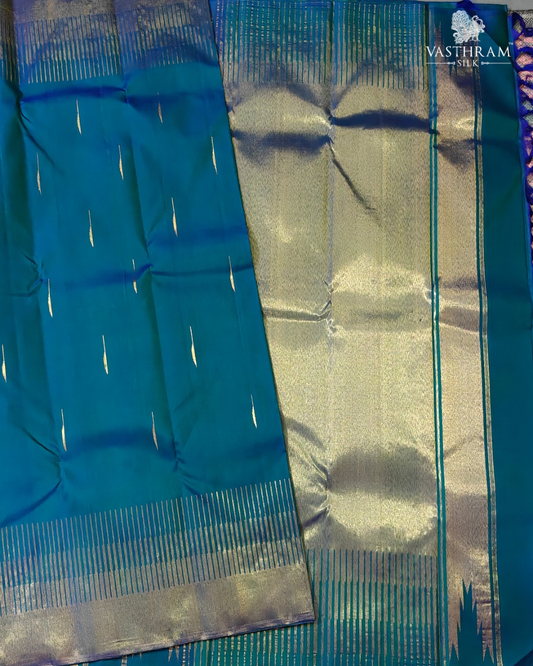 Peacock Blue Colour Kanchivaram Silk Saree With Rain Drops Zari Butta All Over