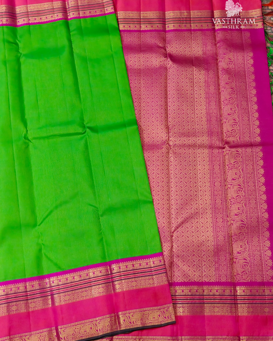 Parrot Green Colour Kanchivaram Silk Saree With Small Zari Stripes All Over