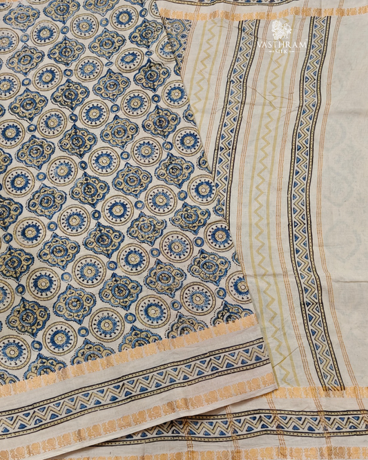 Cream colour & sungudi cotton saree with ajrakh print all over