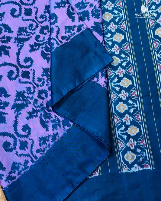 Lavender colour ikkat silk saree with ikkat weaving all over
