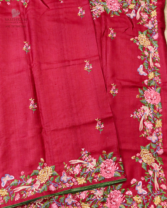 Red colour tussare silk saree with parsigara embroidery butta all over